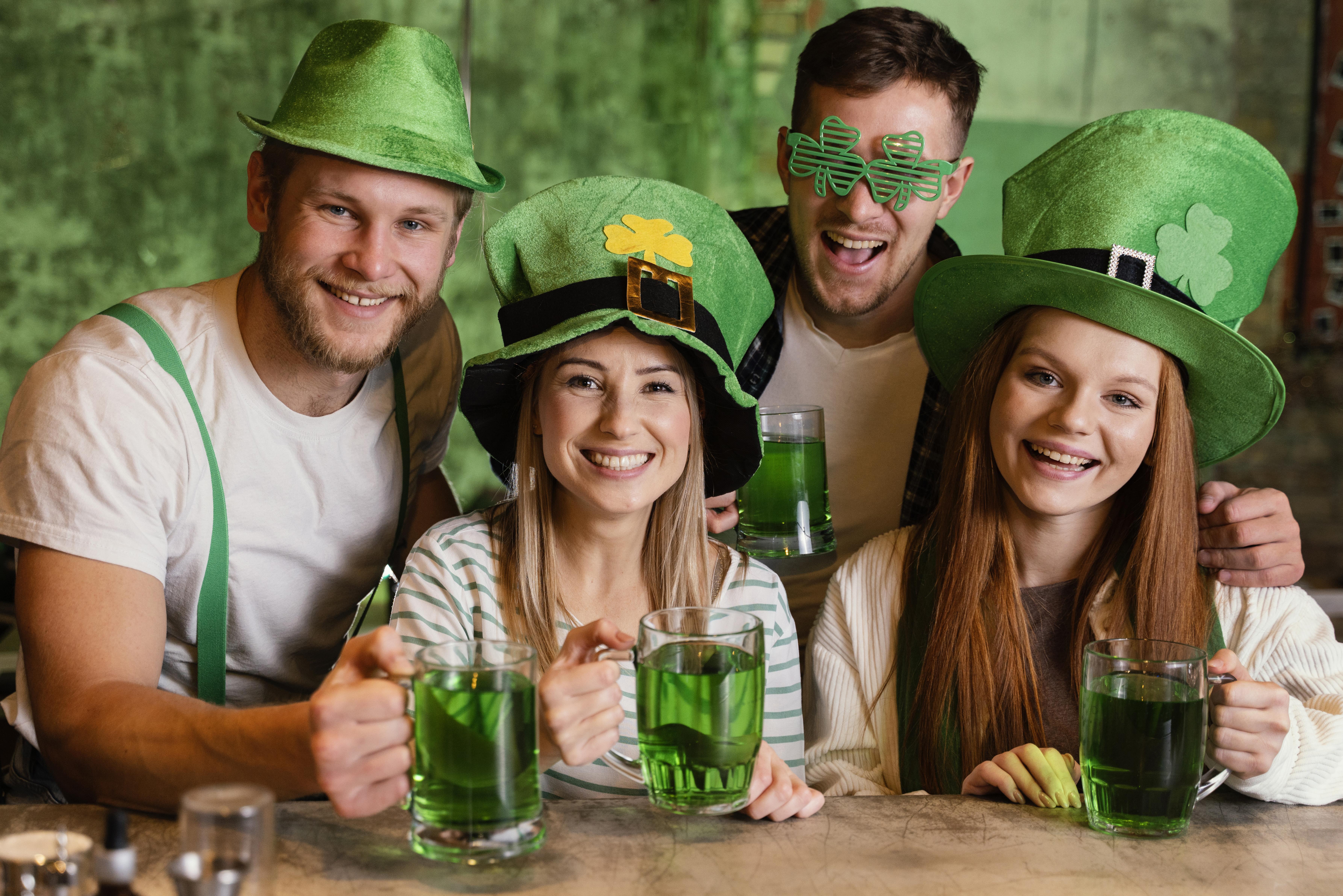 Friends celebrating St. Patrick’s Day at bar 